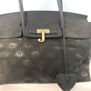 Y2K juicy couture black carry bag with gold charms and metallic highlights
